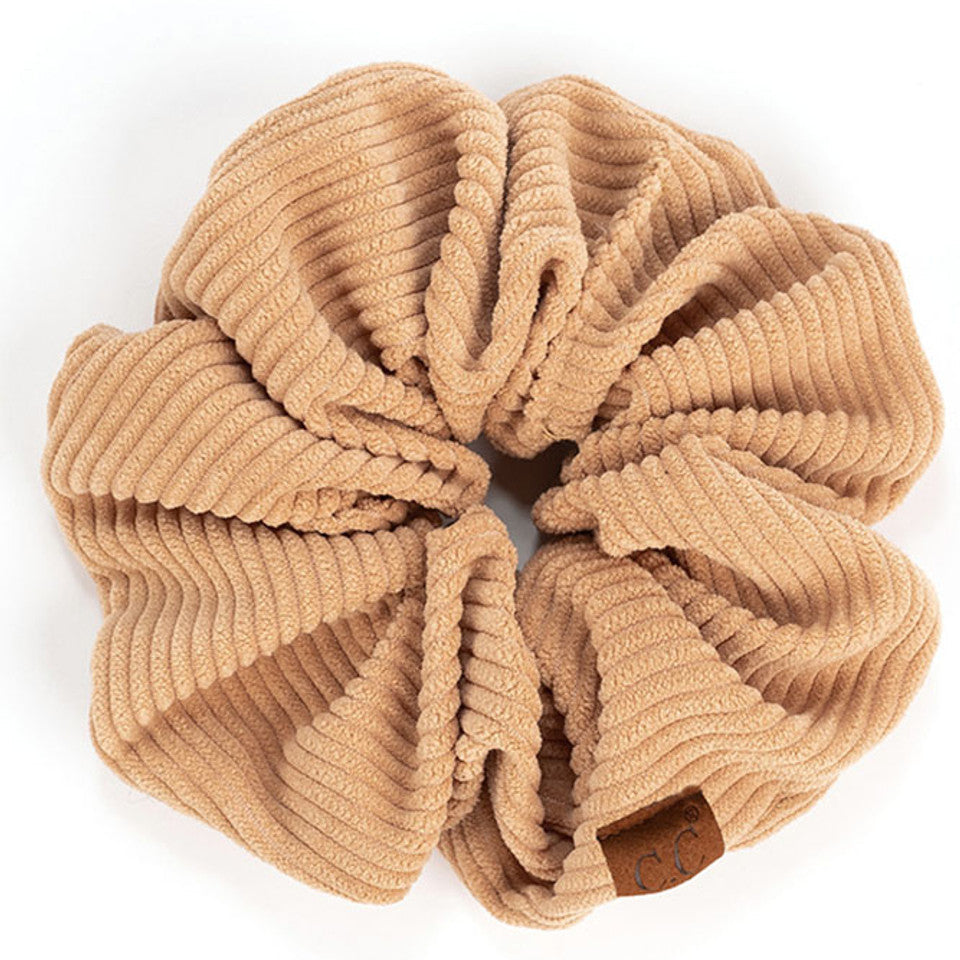Sand C.C Corduroy Solid Color Soft Scrunchies are a must-have for any hair accessory collection. Made from soft and durable corduroy material, these scrunchies are perfect for any hair type and can hold hair in place comfortably without causing any damage. Add some style to your hairstyle with these versatile and fashionable scrunchies.