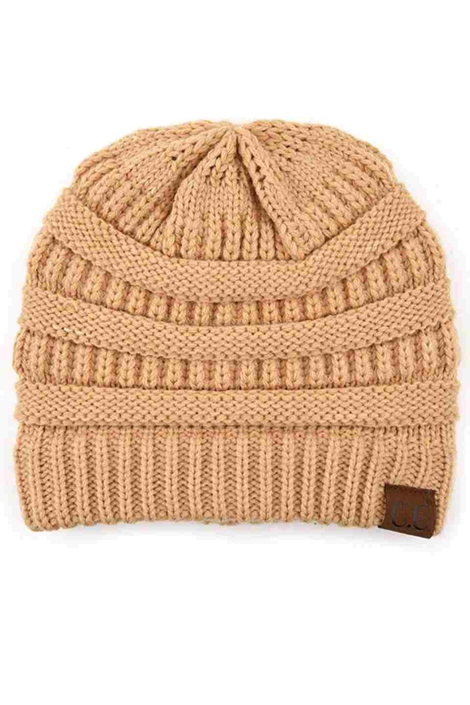 Sand C.C Ribbed Knit Solid Color Beanie offers a timeless design with durable ribbed knitting, ensuring a snug and comfortable fit. Crafted for warmth and versatility, this beanie is perfect for everyday wear, providing reliable protection against cold weather while maintaining a sleek, minimalist style that complements any outfit. Its solid color adds understated appeal, making it an essential accessory for both casual and outdoor use.