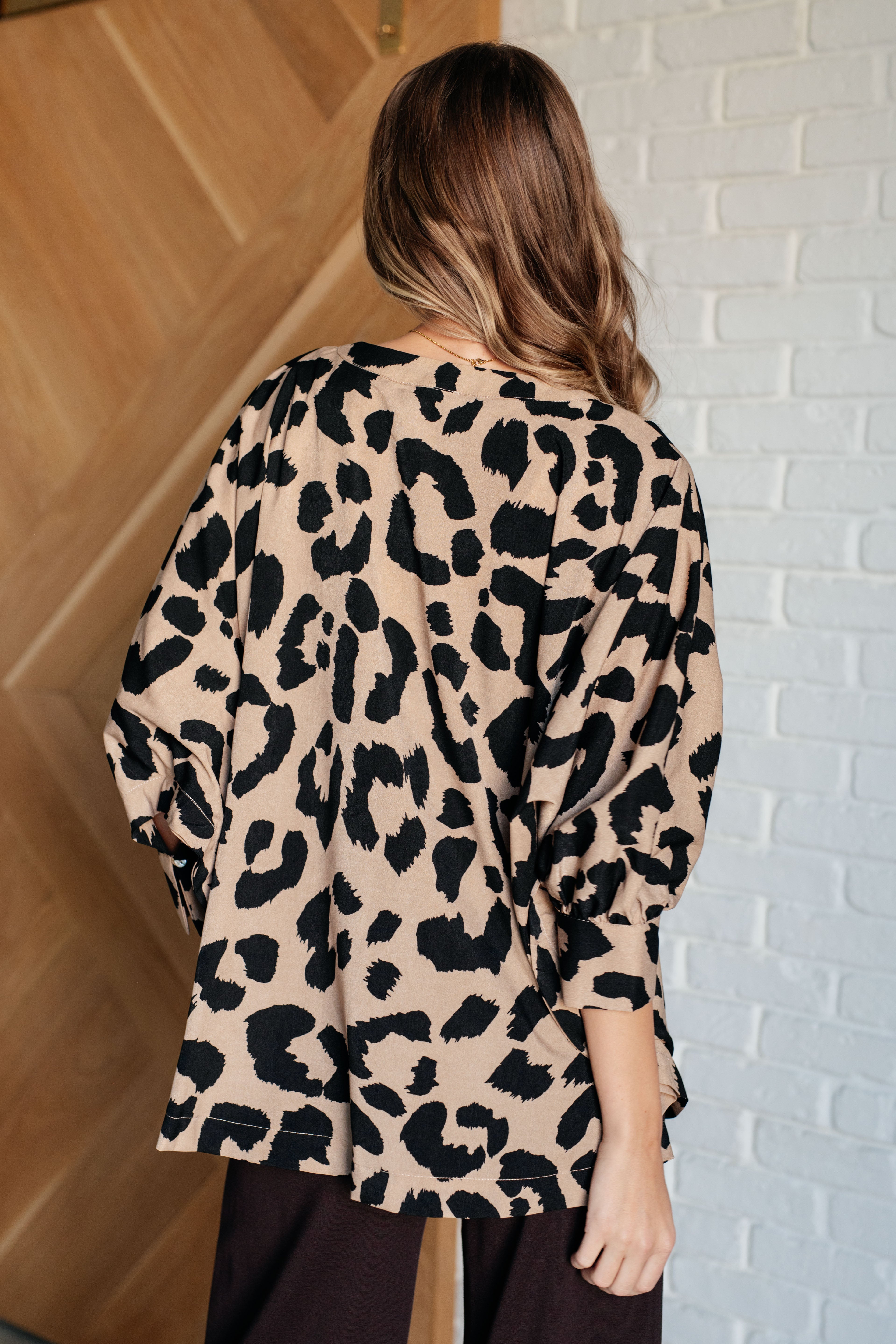She's Got Eyes of Gold Batwing Blouse - Charming Charlie