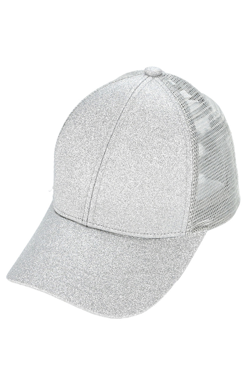 Silver C.C Glitter Mesh Back Criss-Cross Ponytail Cap features a glitter mesh back and criss-cross design, perfect for adding a touch of sparkle to any outfit. Its unique design allows for comfortable and secure wear while keeping your ponytail in place. A must-have accessory for any fashion-forward individual.