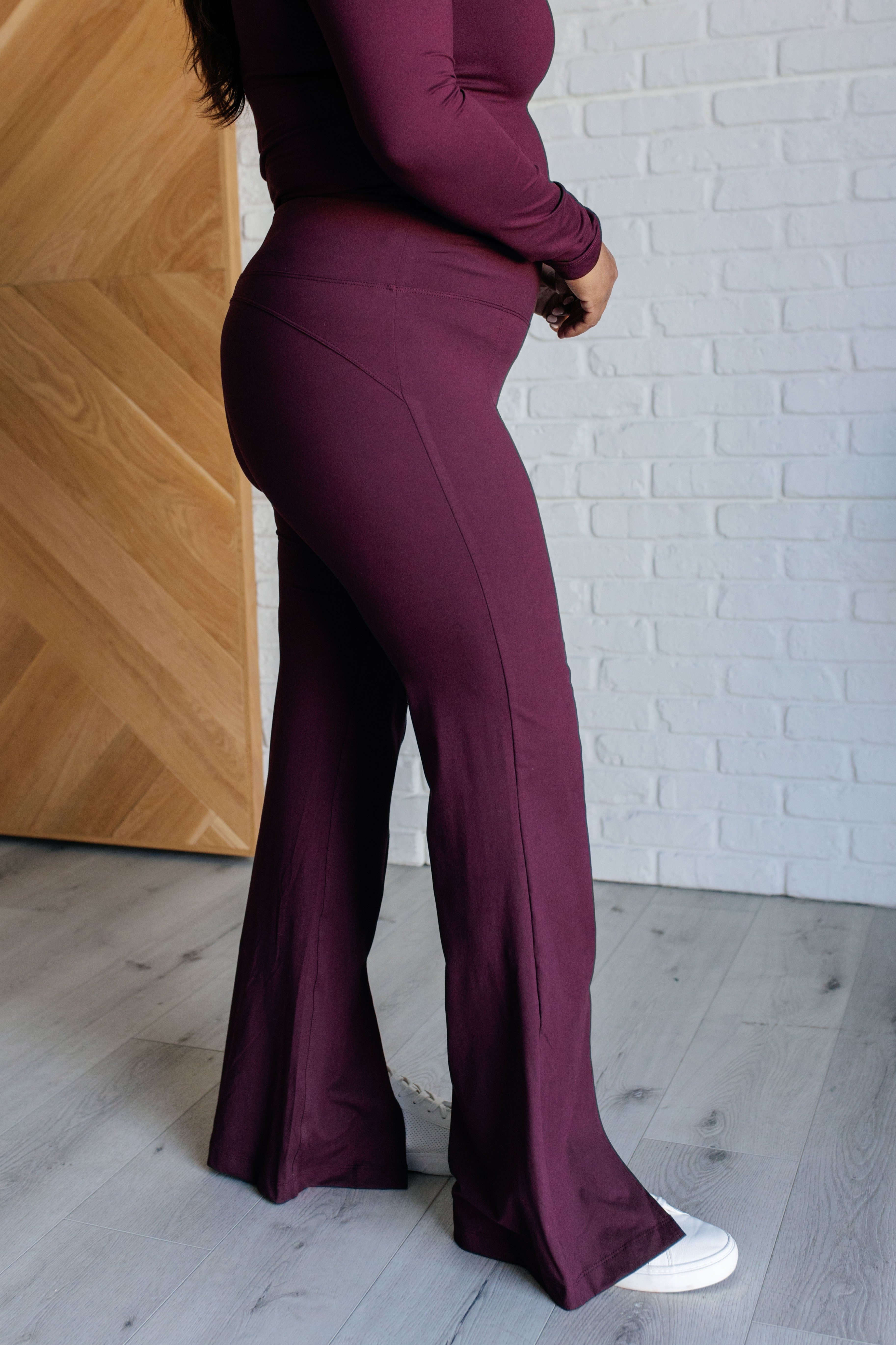 Stamina Stride Flare Leggings in Cassis - Charming Charlie