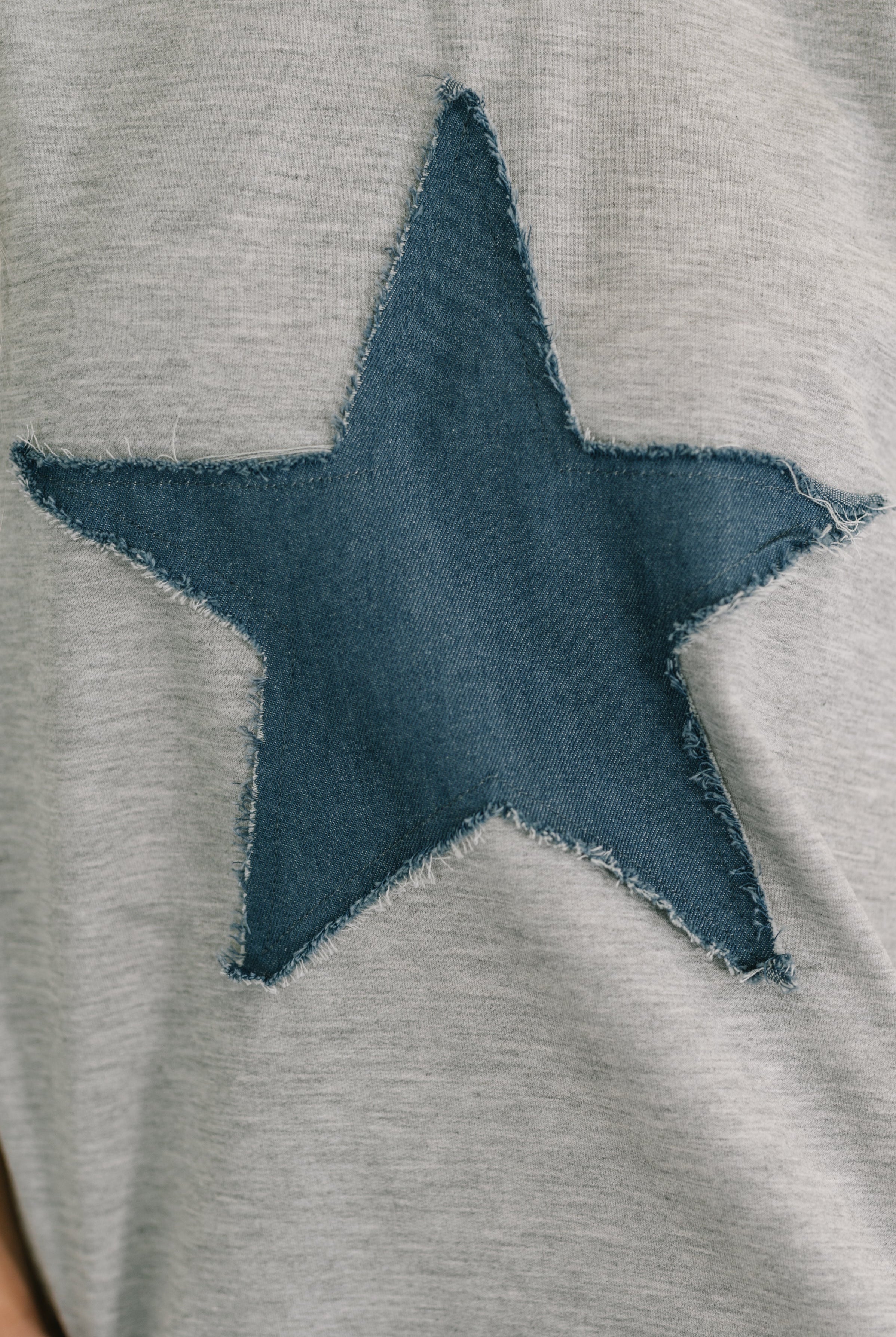 Star Stud Distressed Applique Top - Charming Charlie