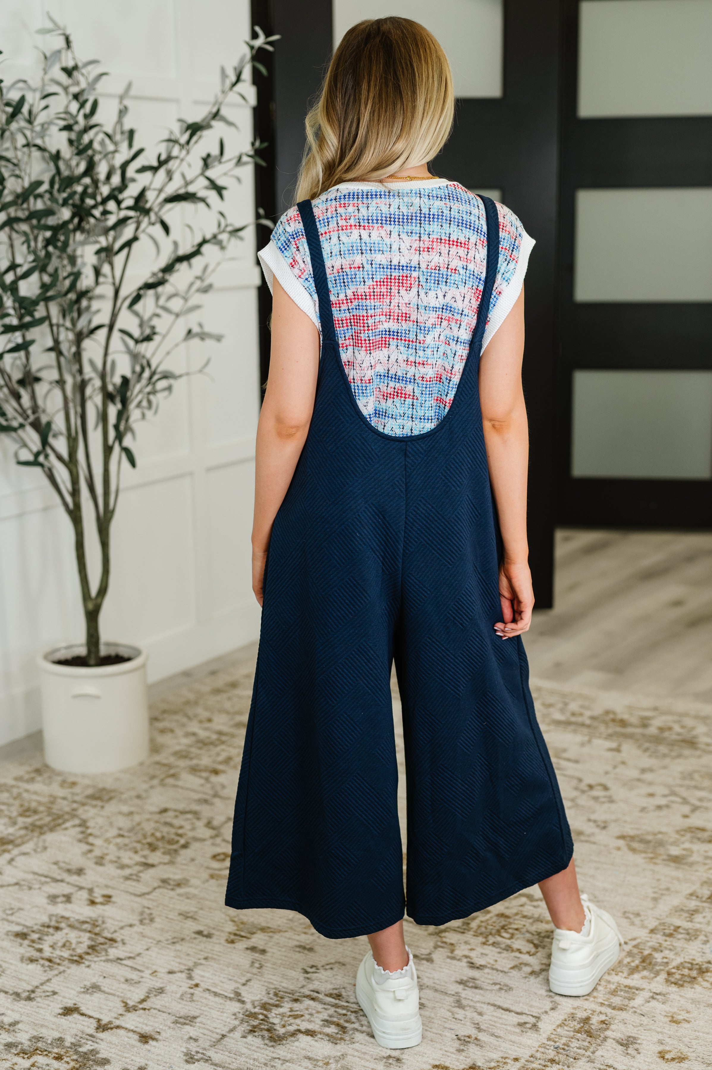 Suit Yourself Adjustable Strap Jumpsuit in Navy - Charming Charlie