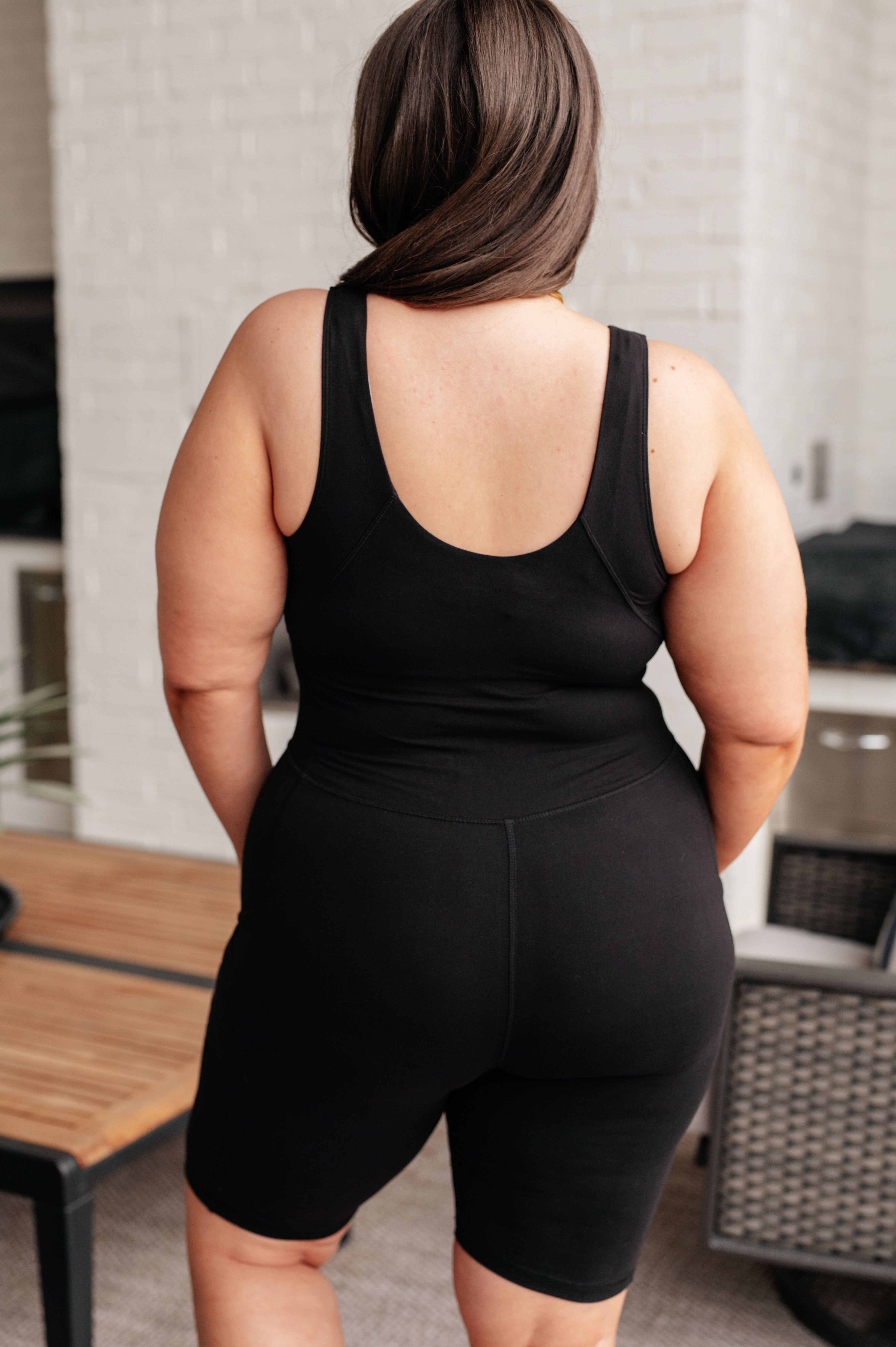 Sun Salutations Body Suit in Black - Charming Charlie
