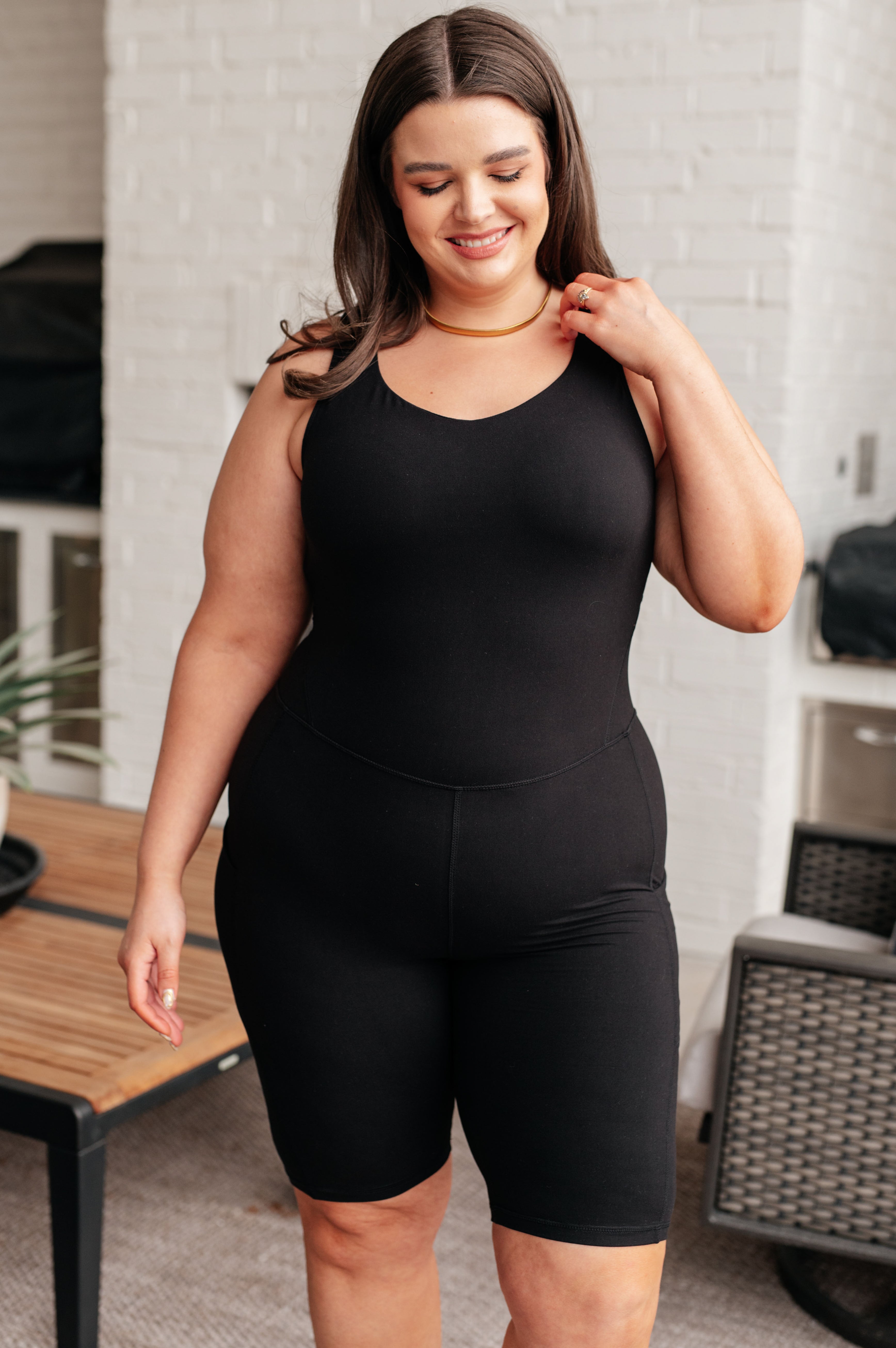 Sun Salutations Body Suit in Black - Charming Charlie