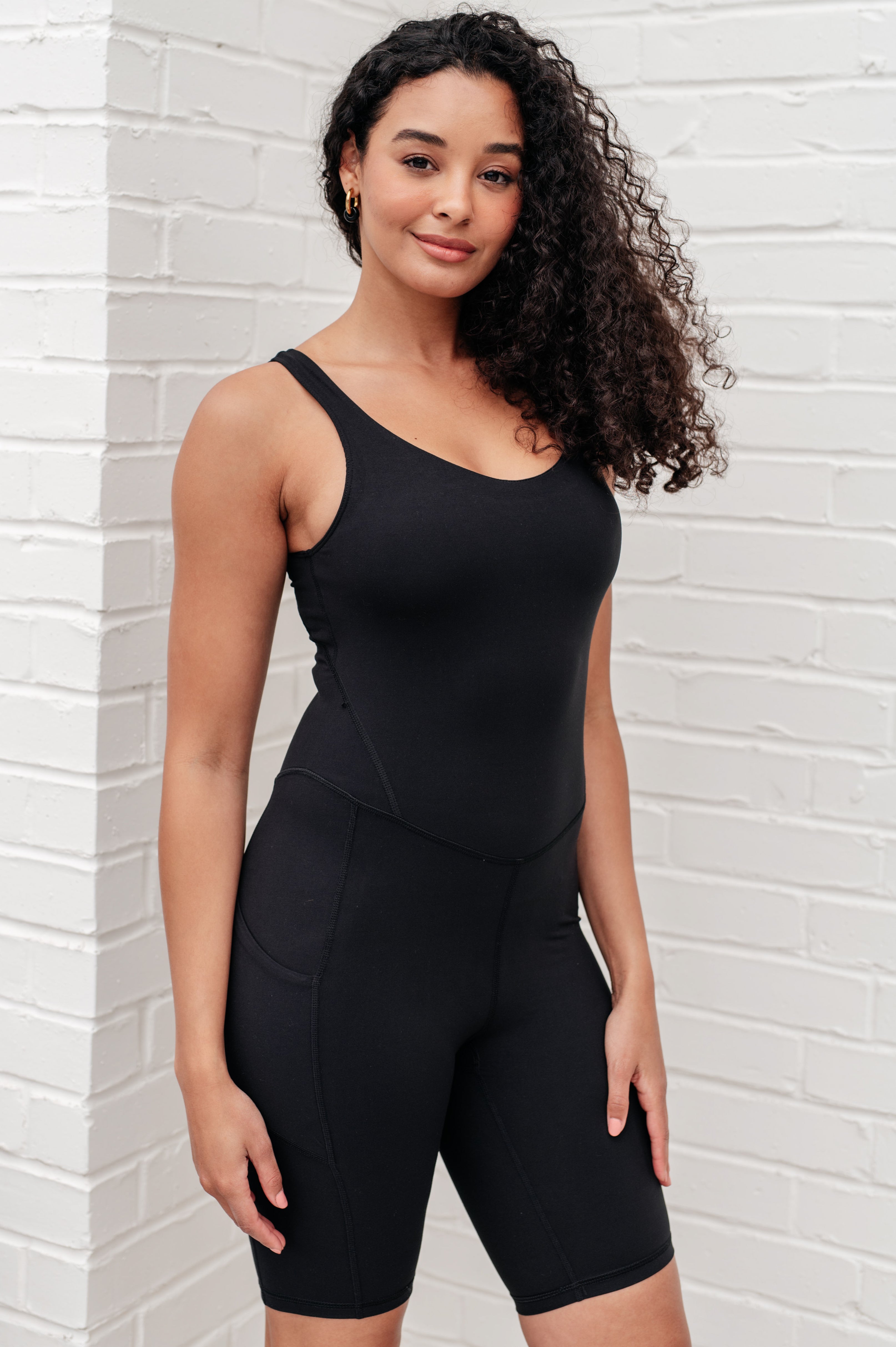 Sun Salutations Body Suit in Black - Charming Charlie