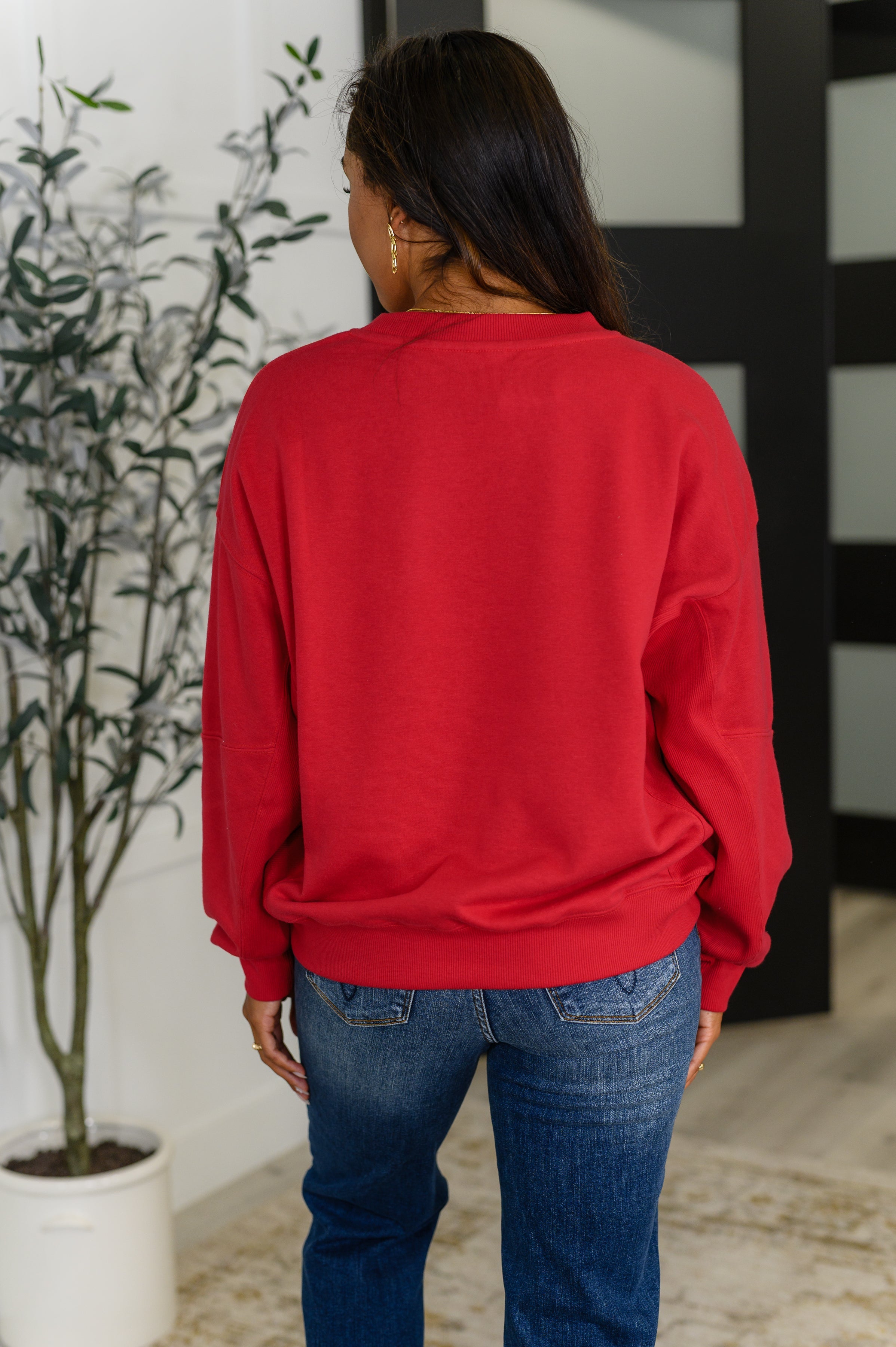 Sweet with a Side Eye Drop Shoulder Pullover in True Red - Charming Charlie