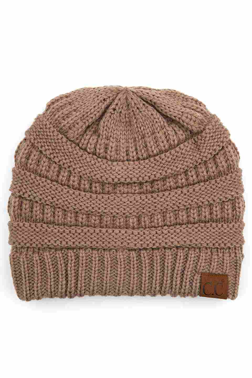Taupe C.C Ribbed Knit Solid Color Beanie offers a timeless design with durable ribbed knitting, ensuring a snug and comfortable fit. Crafted for warmth and versatility, this beanie is perfect for everyday wear, providing reliable protection against cold weather while maintaining a sleek, minimalist style that complements any outfit. Its solid color adds understated appeal, making it an essential accessory for both casual and outdoor use.