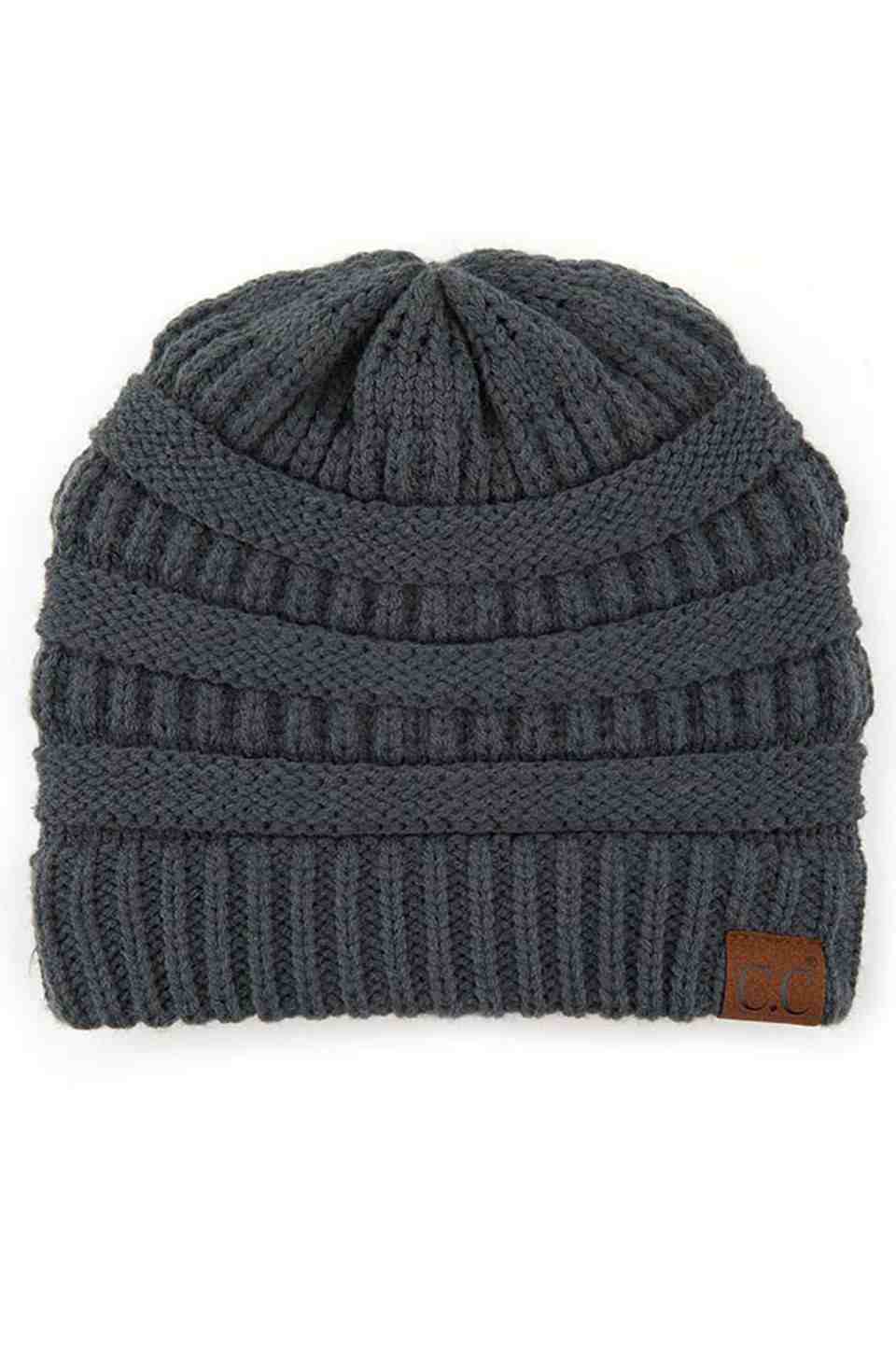 TealGrey C.C Ribbed Knit Solid Color Beanie offers a timeless design with durable ribbed knitting, ensuring a snug and comfortable fit. Crafted for warmth and versatility, this beanie is perfect for everyday wear, providing reliable protection against cold weather while maintaining a sleek, minimalist style that complements any outfit. Its solid color adds understated appeal, making it an essential accessory for both casual and outdoor use.