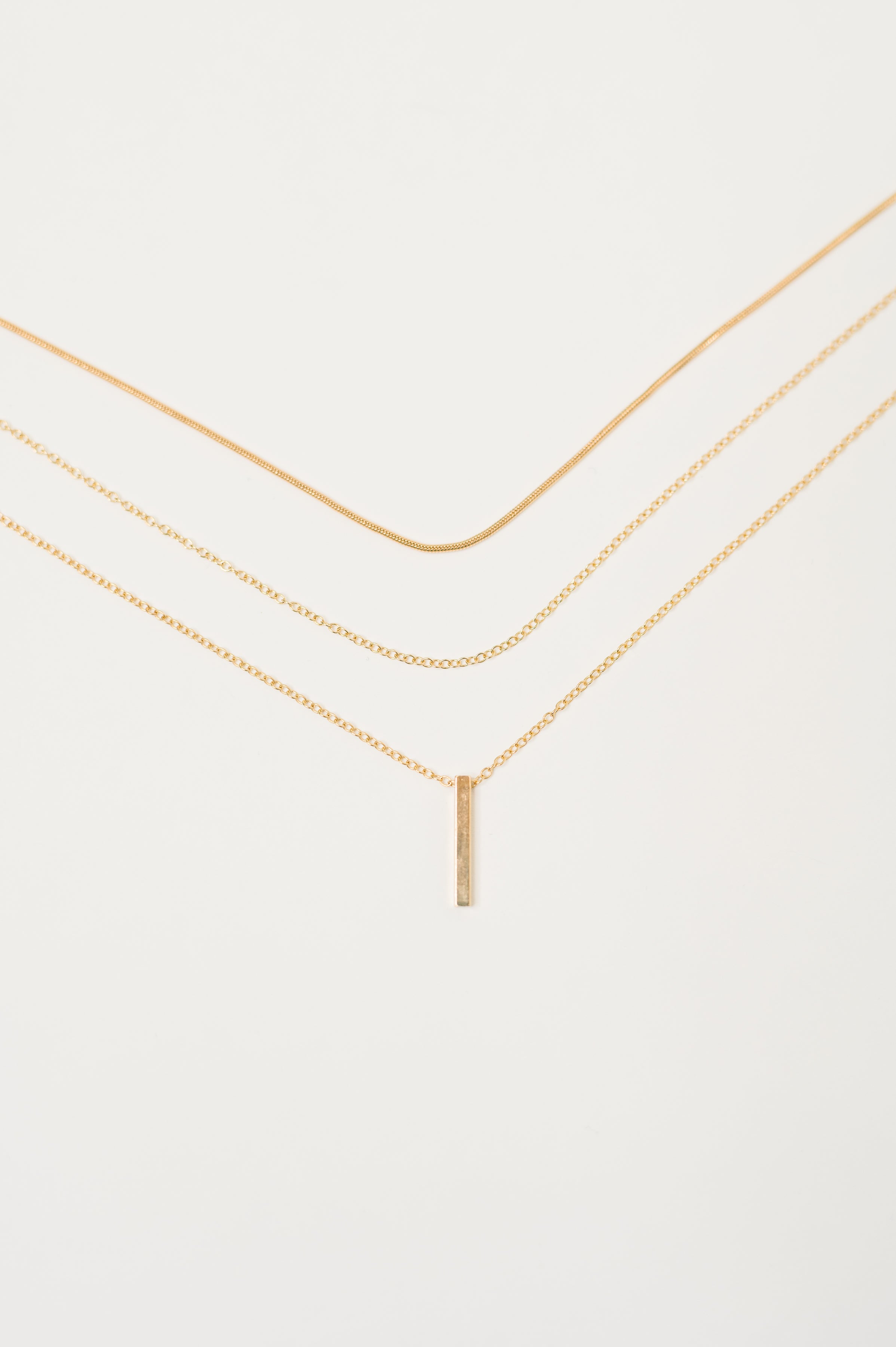 The Signature Set Layered Necklace Set in Gold - Charming Charlie