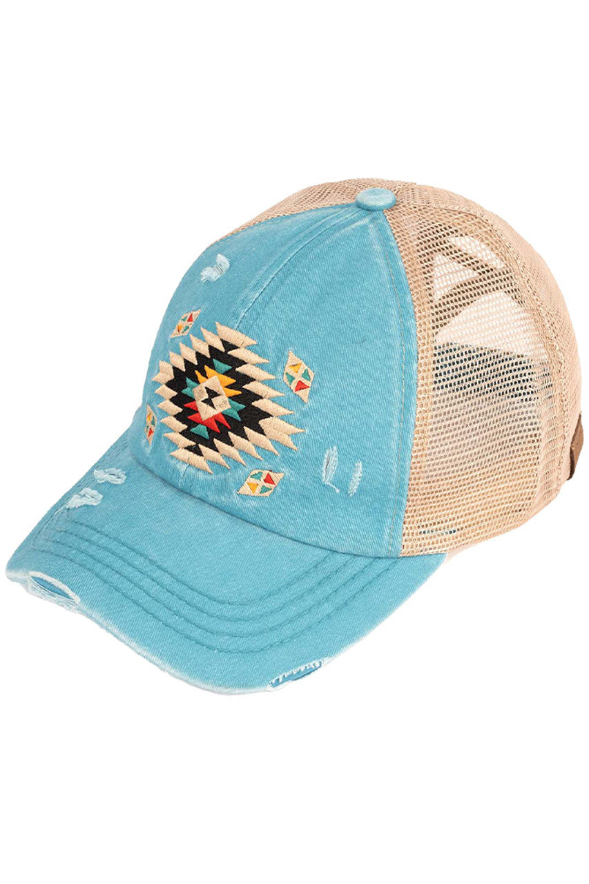 Tourquoise C.C AZTEC PATCH DISTRESSED PONY CAP is a stylish and versatile accessory that combines functionality with fashion. Made of high-quality materials, it features an eye-catching aztec patch design and a distressed finish for a trendy look. Stay protected from the sun and add a touch of personality to your outfit with this must-have cap.
