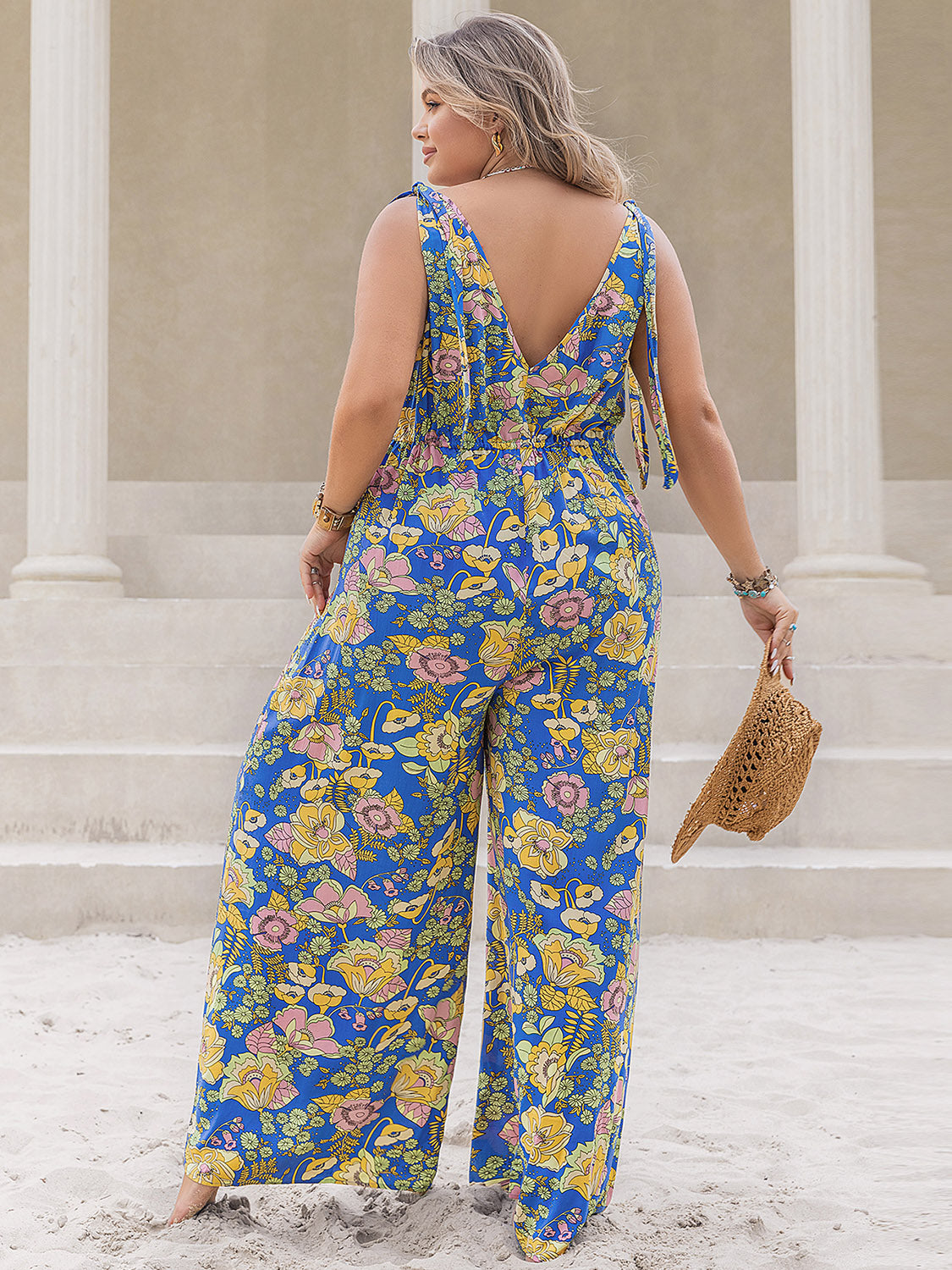 Plus Size Printed V-Neck Wide Leg Jumpsuit - Charming Charlie