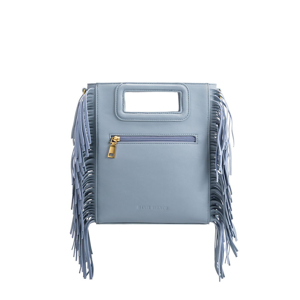 A square structure sky vegan leather crossbody bag with fringe on the side.
