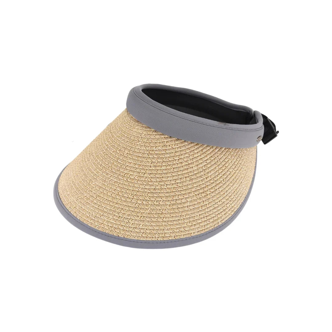 Grey Adjustable Straw Visor C.C Sunhat offers expert sun protection with a stylish, breathable design. Crafted from durable straw, it features an adjustable strap for a customized fit, ensuring comfort during extended wear. Ideal for outdoor activities, this sunhat shields your face from harmful UV rays while maintaining ventilation to keep you cool. Its versatile design complements various outfits, making it a practical and fashionable accessory for sunny days.