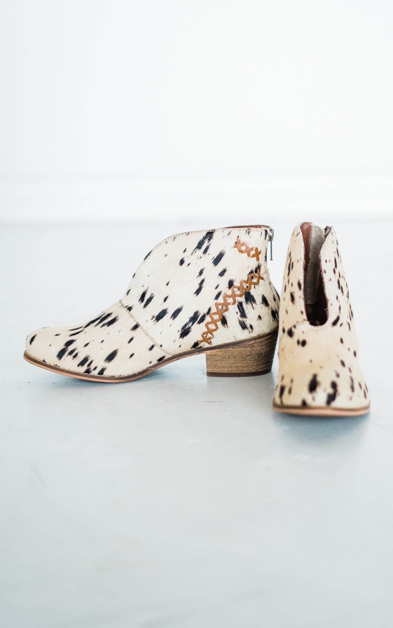 All Roads Bootie in Black and White - Charming Charlie