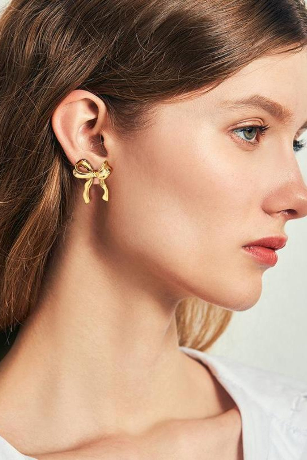 Brass Bow Stud Earrings - Charming Charlie