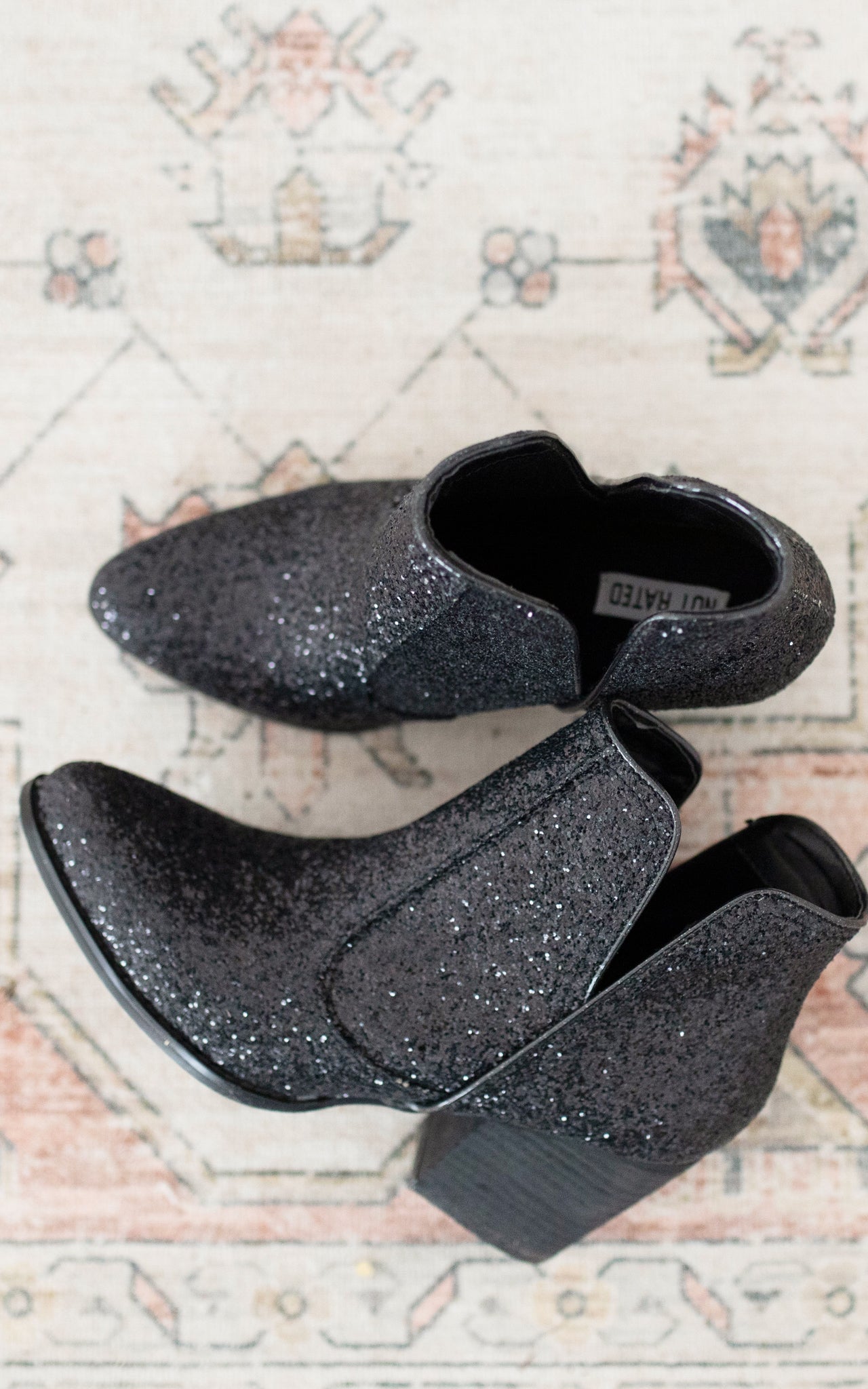 Fiera Booties in Black - Charming Charlie