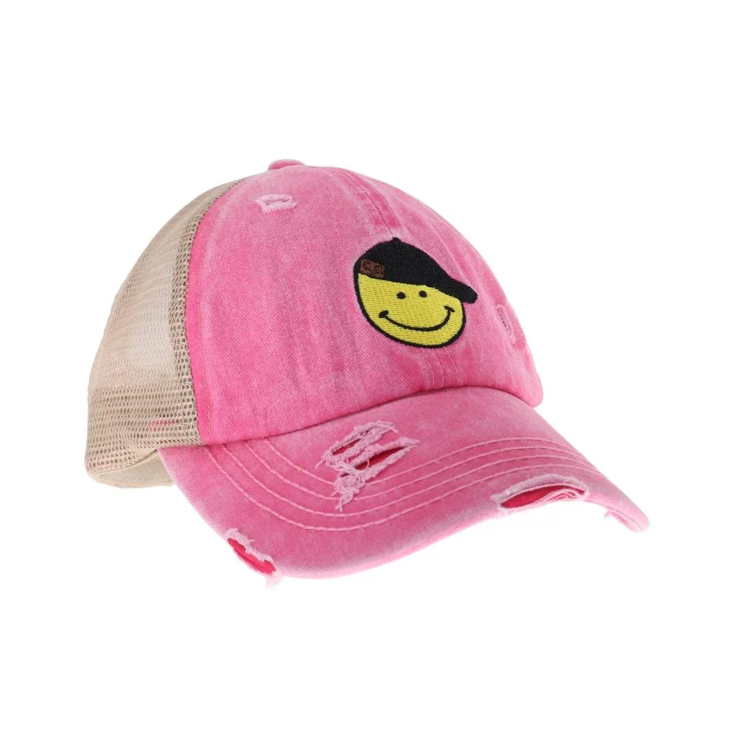 Pink C.C Smiley Face Embroidered Criss Cross High Pony C.C Ball Cap combines practical design with playful style. Featuring an embroidered smiley face and a criss-cross opening at the back, this cap is tailored to comfortably fit high ponytails. Made from durable, breathable fabric, it ensures a secure fit and all-day comfort, making it an excellent choice for active lifestyles or casual wear. This cap offers a smart solution for those who want to keep their hair up without sacrificing style.