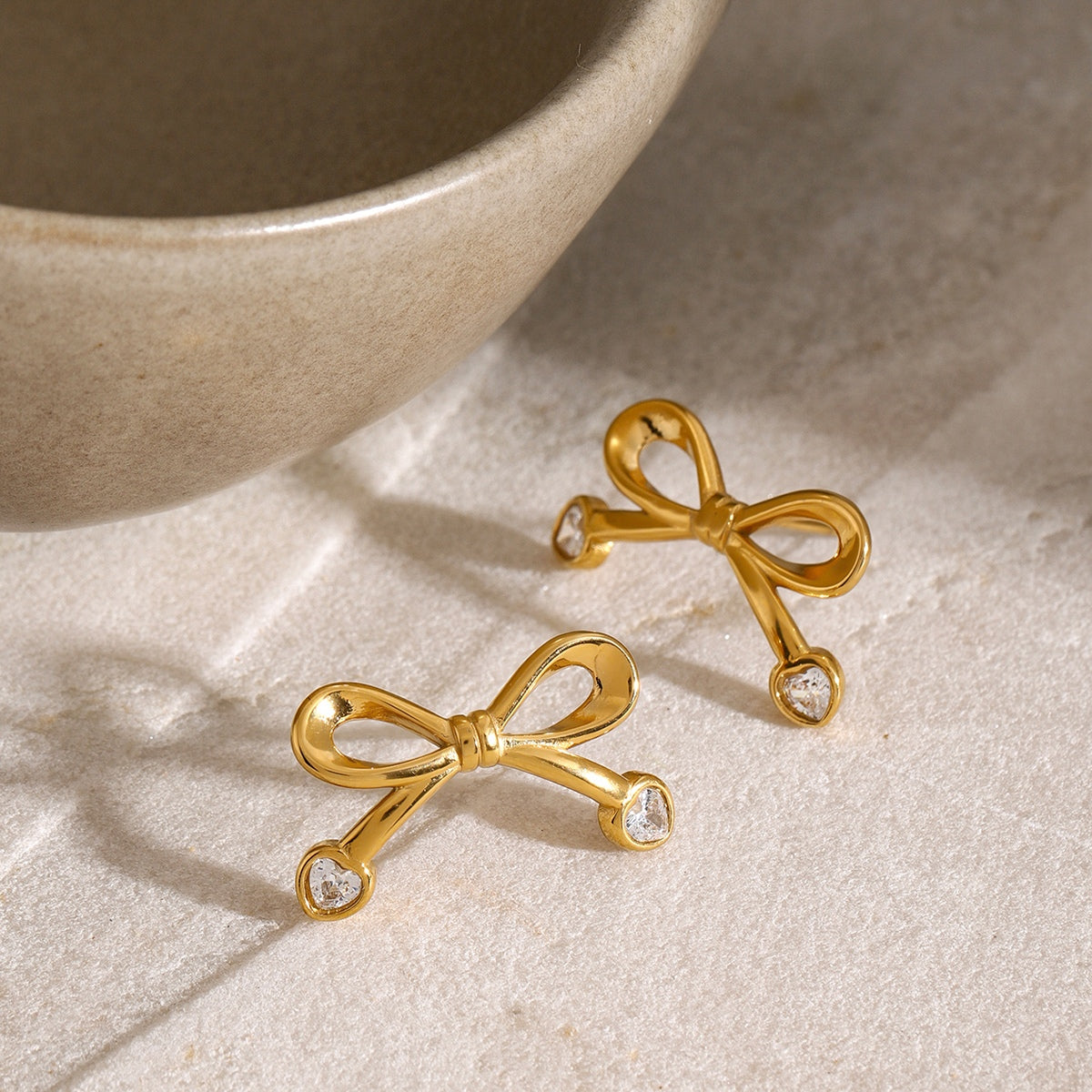 Stainless Steel Inlaid Zircon Bow Earrings - Charming Charlie