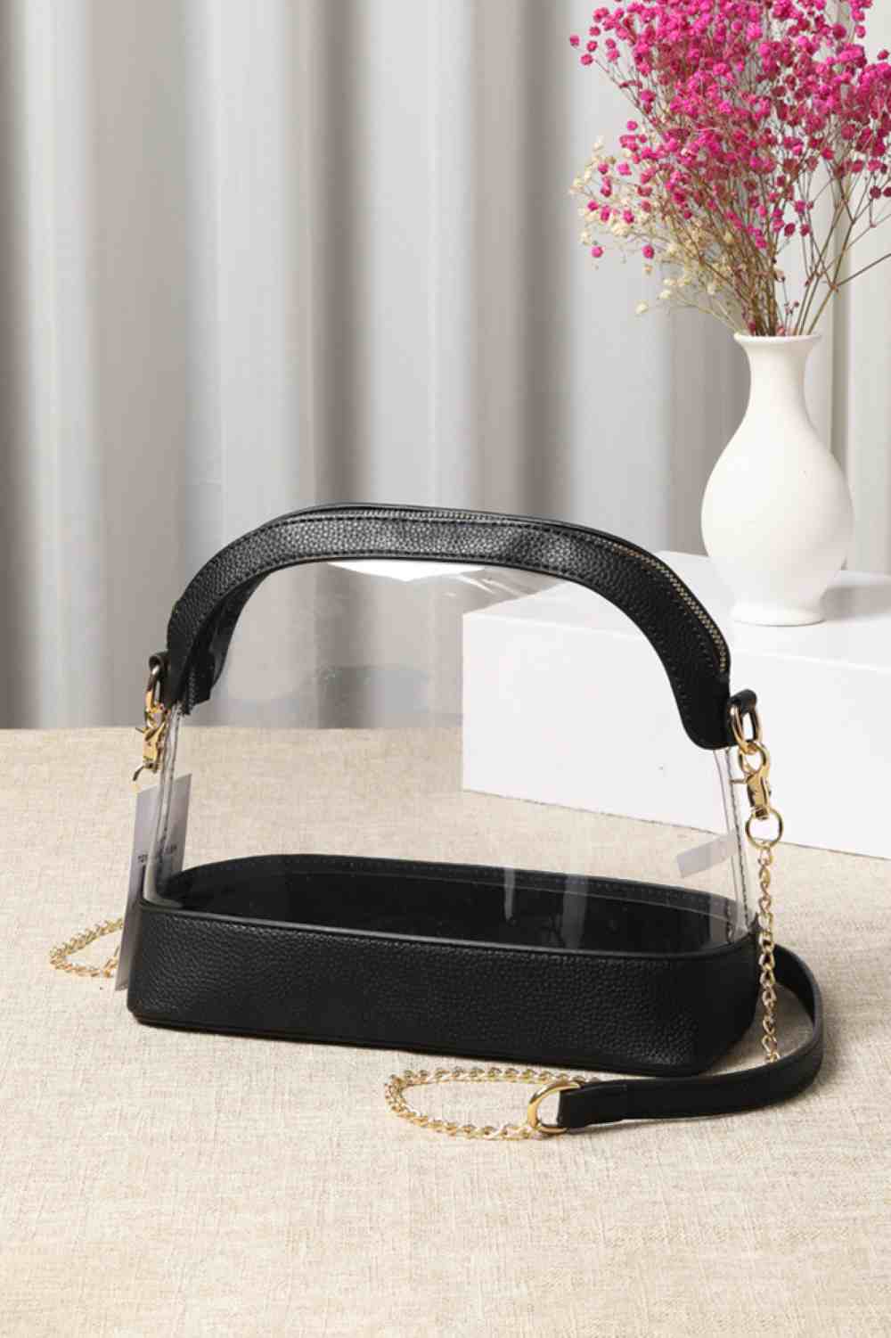 Black Clear Stadium Concert Bag is expertly crafted to comply with most venue security policies, featuring a fully transparent design for easy inspection. Its durable, lightweight construction ensures convenience without bulk, while providing ample space for essentials such as tickets, phones, and wallets. Ideal for concert and sports fans, it combines security compliance with practical everyday use.