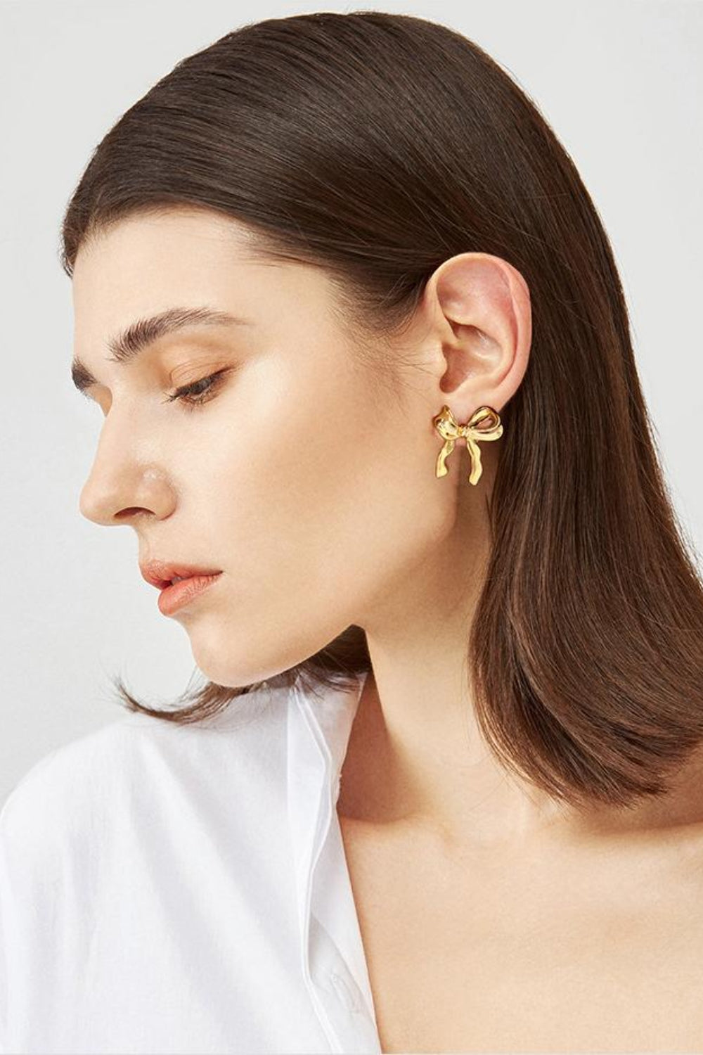 Brass Bow Stud Earrings - Charming Charlie