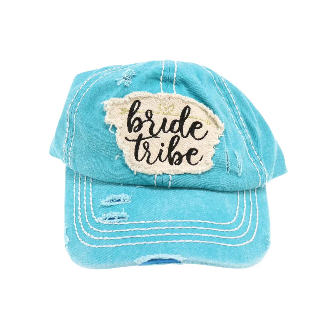 Turquoise Distressed Bride Tribe Patch CC Ball Cap combines casual style with a vintage-inspired look. Featuring a carefully worn finish and a distinctive Bride Tribe patch, it’s perfect for bridal parties seeking a coordinated yet relaxed accessory. The cap offers adjustable comfort and durable construction, making it an ideal choice for celebrating special moments with lasting wear.