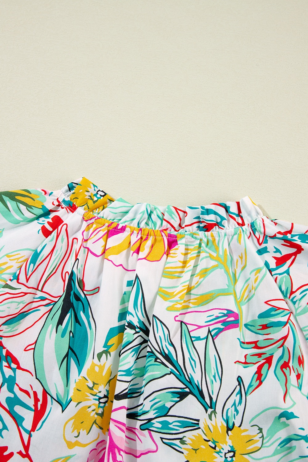 Ruffled Printed Tie Neck Blouse - Charming Charlie