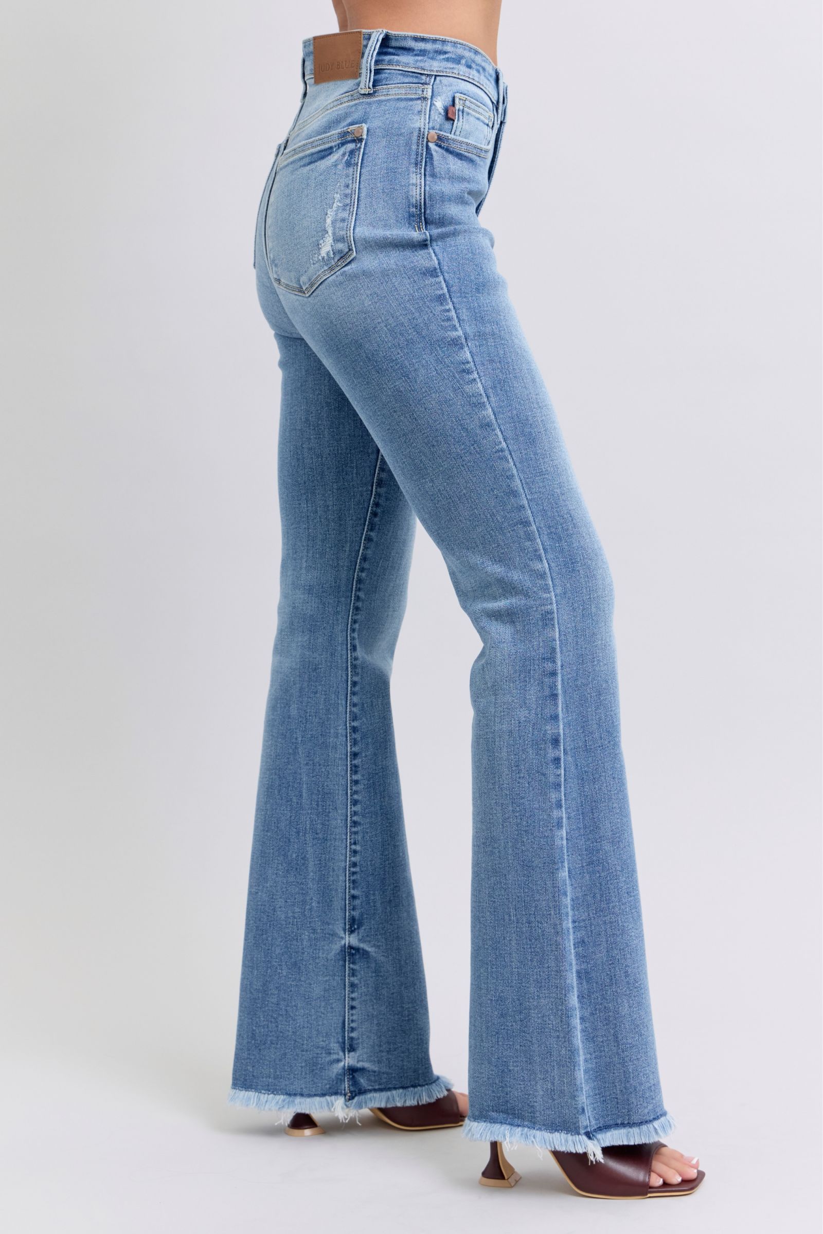 Judy Blue Full Size Raw Hem High Rise Bootcut Jeans - Charming Charlie