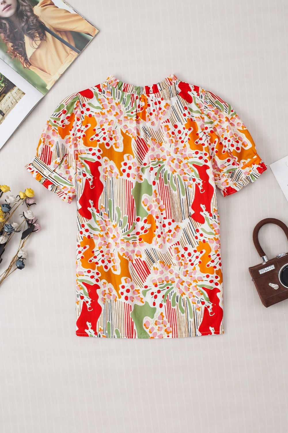 Printed Notched Short Sleeve Blouse - Charming Charlie