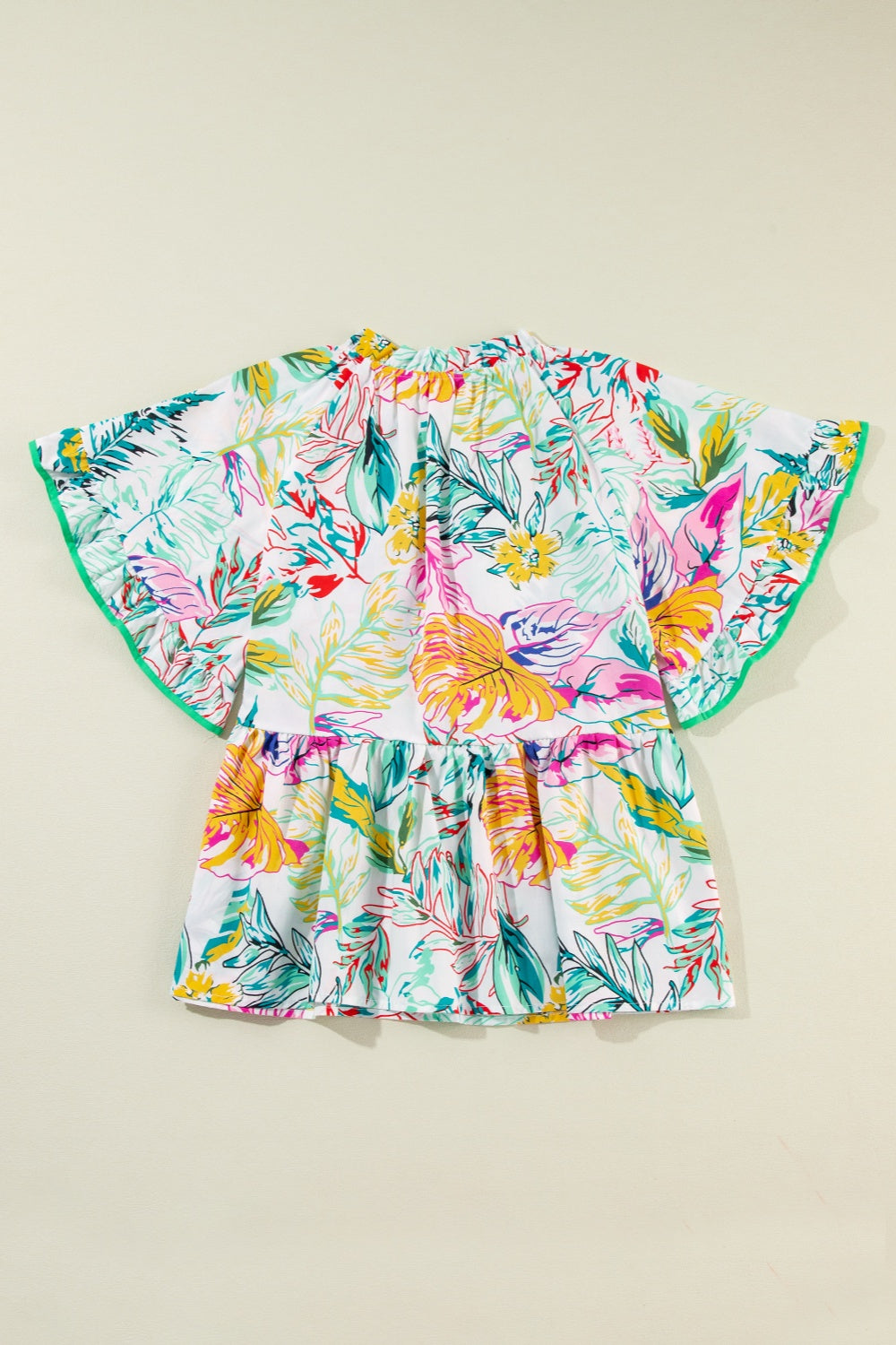 Ruffled Printed Tie Neck Blouse - Charming Charlie