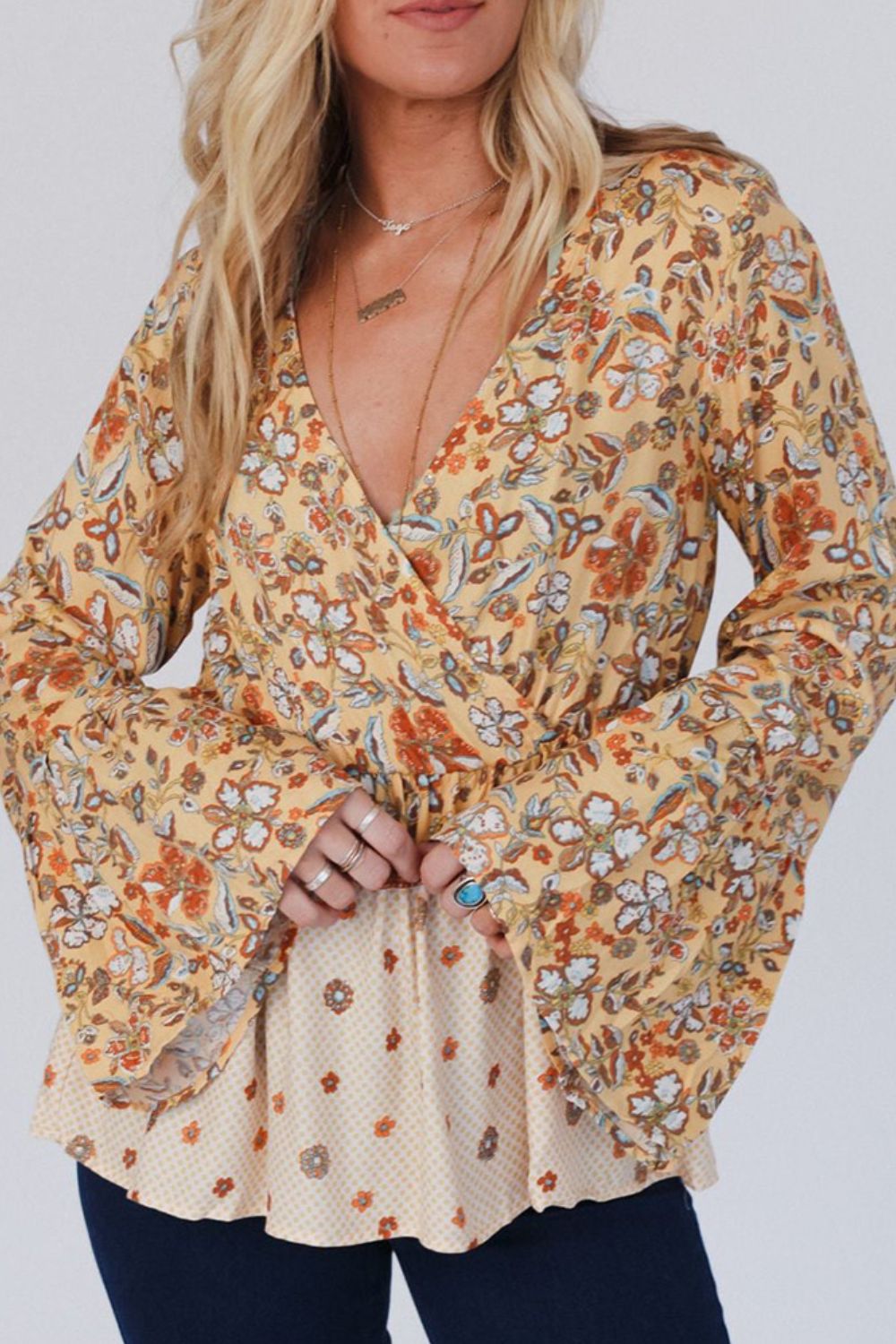 Peplum Printed Surplice Flare Sleeve Blouse - Charming Charlie