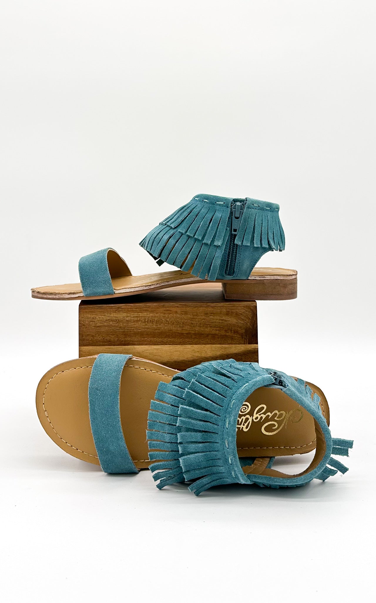 Fringe Star Sandal in Teal - Charming Charlie