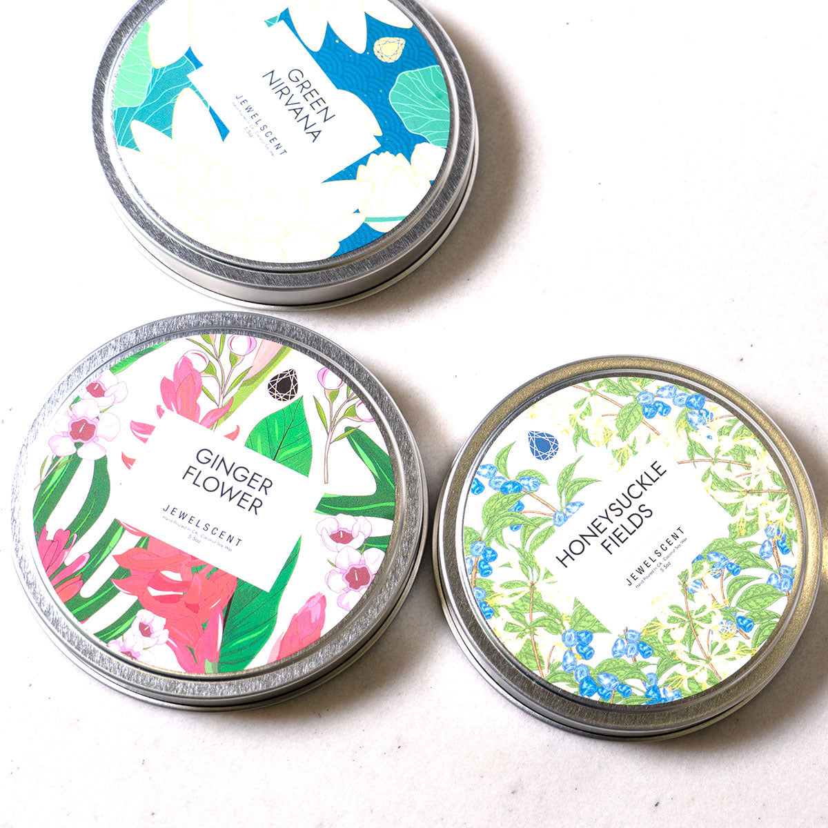 Green Nirvana 5.5oz Tin Jewelry Candle - Charming Charlie