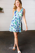 Lovely In Green & Blue Floral Sleeveless Surplice Romper - Charming Charlie