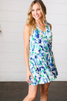 Lovely In Green & Blue Floral Sleeveless Surplice Romper - Charming Charlie