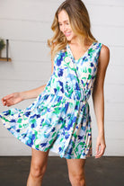 Lovely In Green & Blue Floral Sleeveless Surplice Romper - Charming Charlie