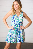 Lovely In Green & Blue Floral Sleeveless Surplice Romper - Charming Charlie