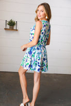 Lovely In Green & Blue Floral Sleeveless Surplice Romper - Charming Charlie
