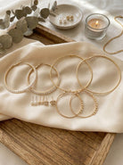 Chic Gold Hoops with Pearl Stud Trio Earrings - Charming Charlie