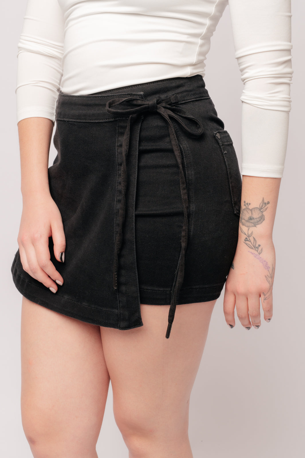 Bentli High Rise Side Tie Denim Skort in Black - Charming Charlie