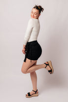 Bentli High Rise Side Tie Denim Skort in Black - Charming Charlie