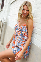 Sunny Days Coral Ruffle V Neck Floral Print Sleeveless Top - Charming Charlie