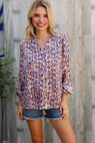 On A Wild Streak V Neck Fabric Button Detail Blouse - Charming Charlie