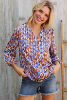 On A Wild Streak V Neck Fabric Button Detail Blouse - Charming Charlie