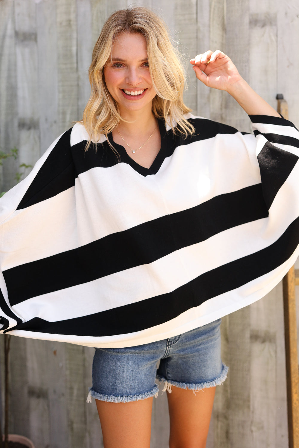 The Traveler Black/White Stripe Dolman Notch Neck Sweater Poncho - Charming Charlie