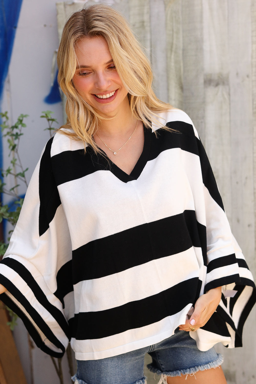The Traveler Black/White Stripe Dolman Notch Neck Sweater Poncho - Charming Charlie