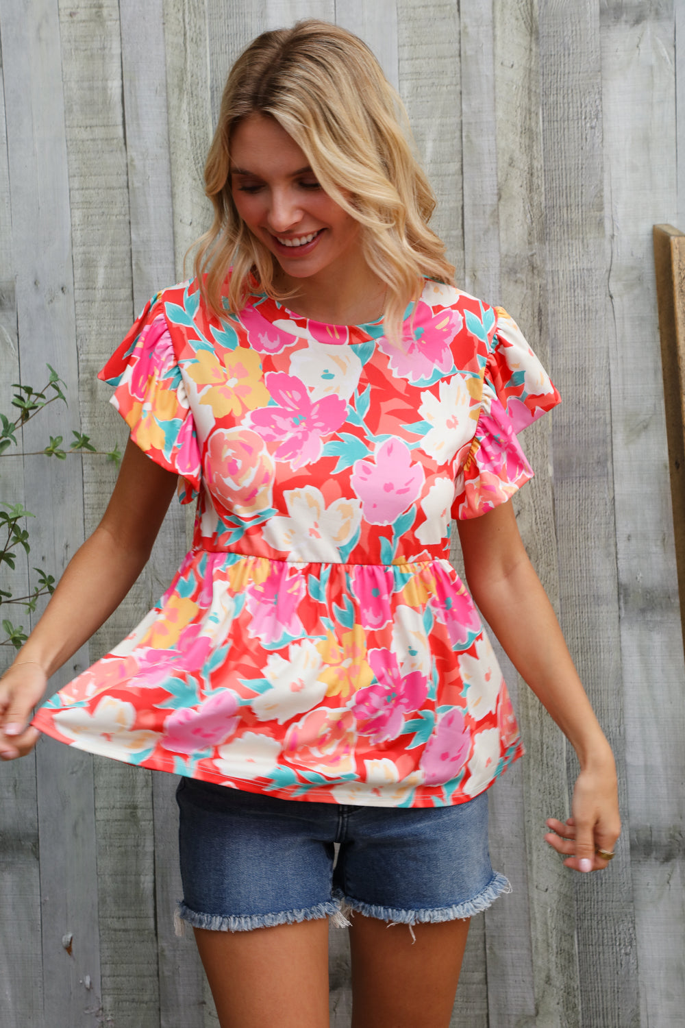 Feeling Femme' Coral Floral Print Folded Short Sleeve Babydoll Top - Charming Charlie