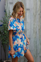 Feeling Bold Turquoise Floral Smocked Waist Flutter Sleeve Romper - Charming Charlie