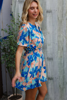 Feeling Bold Turquoise Floral Smocked Waist Flutter Sleeve Romper - Charming Charlie