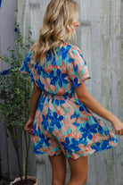Feeling Bold Turquoise Floral Smocked Waist Flutter Sleeve Romper - Charming Charlie